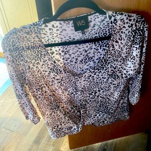 Stretchy animal print v neck shirt